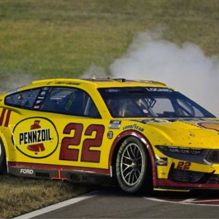 Joey Logano won a wild Ally 400 NASCAR Cup Series race at Nashville Superspeedway that took a record five overtimes and 31 additional laps to complete.